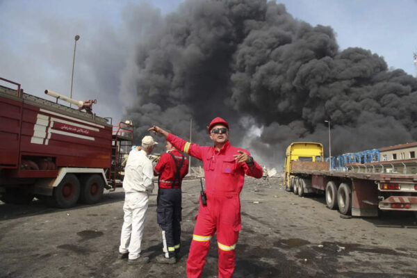 Explosion and blaze at Iranian port kill 25, injure 800; chemical shipment may be linked to disaster Explosion and blaze at Iranian port kill 25, injure 800; chemical shipment may be linked to disaster