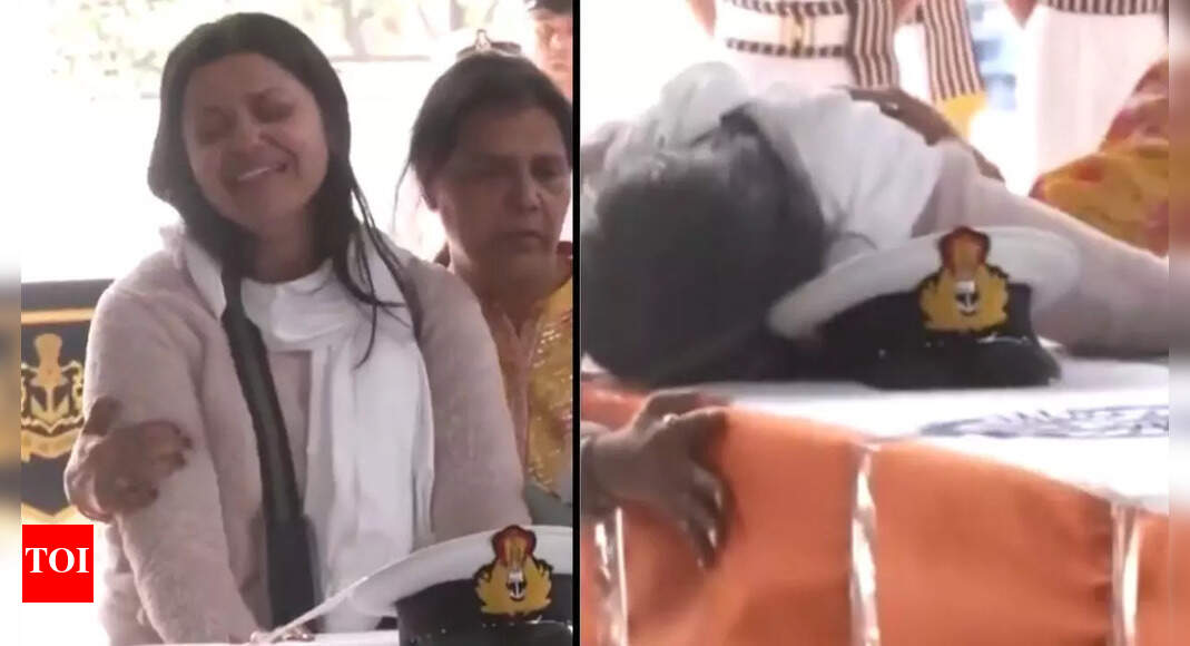 'Jai Hind': Wife of slain Navy officer Vinay Narwal bids tearful adieu, embraces 'tricolour' wrapped coffin | India News